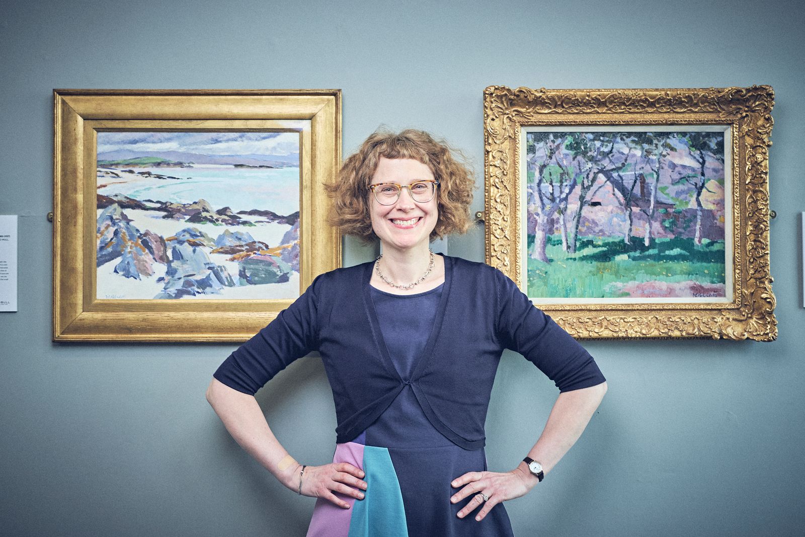 Alice Strang with works by F. C. B. Cadell in Lyon & Turnbull’s Glasgow Gallery  Photo: Alex Robson